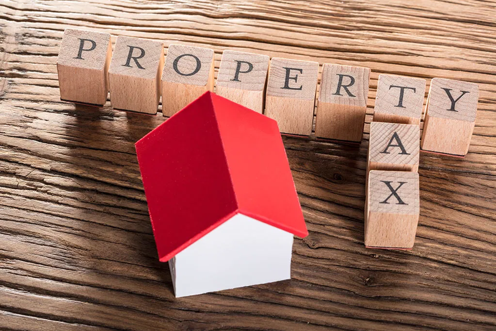 Real Estate Taxes Vs. Property Taxes